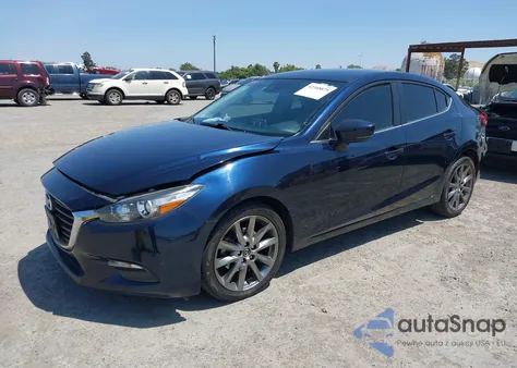 2018 Mazda Mazda3 Touring from USA, damaged, VIN 3MZBN1V35JM185841